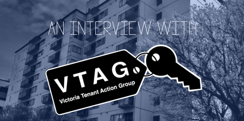 The image shows the Victoria Tenant Action Group logo, a key with a tag that says VTAG, in front of an apartment building. The photo has a blue tint and is captioned "An interview with VTAG"