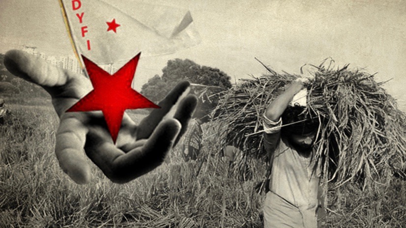 An outstretched hand holding a red star and a flag that says "DYFI" reaches down to a man carrying straw in a field.