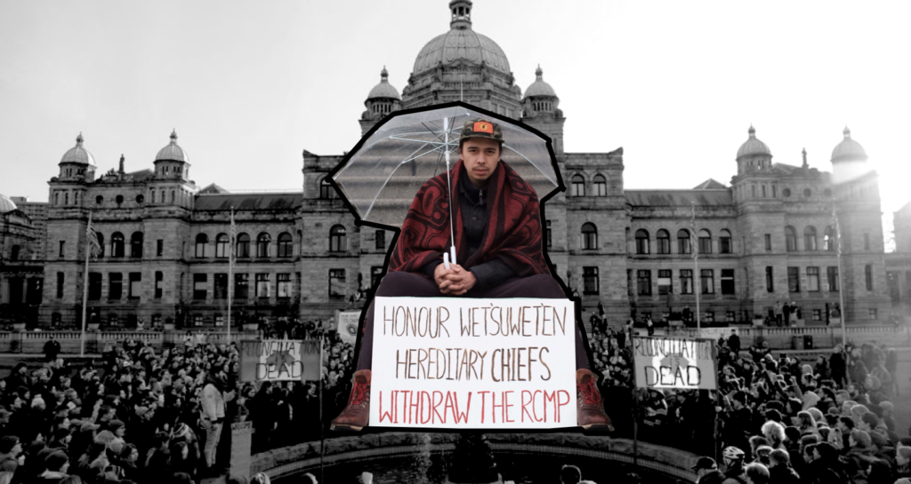 A photo of Kolin Sutherland-Wilson wrapped in a blanket with an umbrella and a sign that says "Honour Wetsuweten Hereditary Chiefs: Withdraw the RCMP". Behind him is a black and white image of the BC Legislature building.