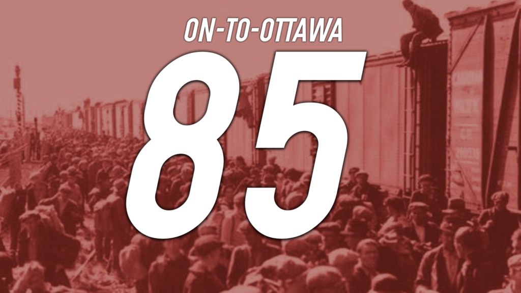 A red-tinted photo of On-to-Ottawa Trekkers boarding a train. It says "On-to-Ottawa 85" in white italicized text