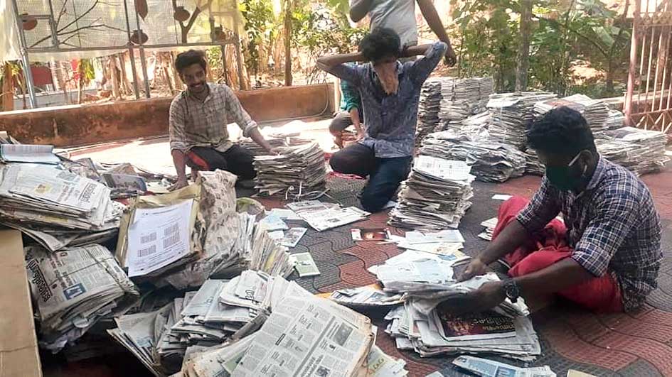 Progressive youth in Kerala, India sort through recycling.