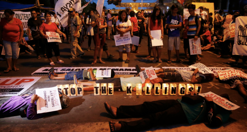 A candlelight die-in at the Presidential Palace in Manila